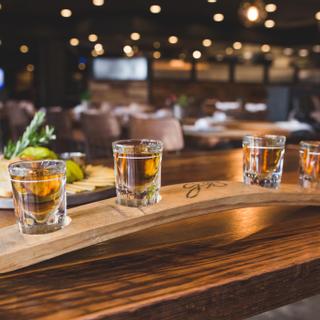 Best Western Plus Hilltop Inn | Redding, California | Curved shot glass board with four filled shots